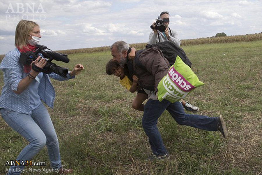 لگد زدن فیلم‌بردار زن مجارستانی به پدر و فرزند آواره سوری + تصاویر