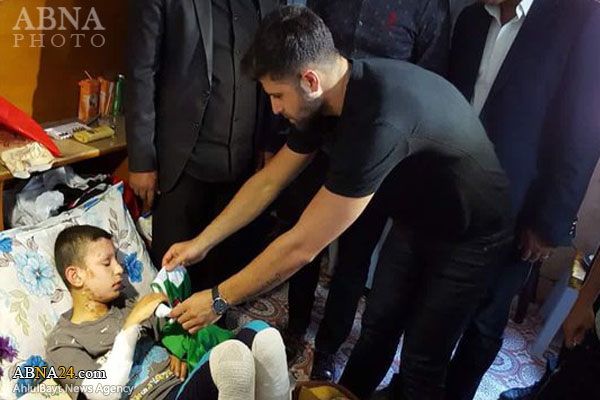 فوتبالیست مشهور به عیادت کودکان مجروح عراقی رفت +عکس