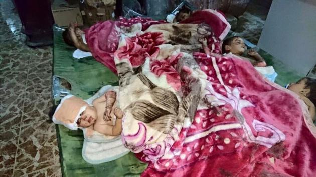قتل عام خانواده های فراری توسط داعش+ تصاویر