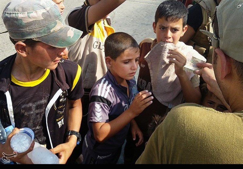 نجات کودکان عراقی به دست نیروهای داوطلب مردمی
