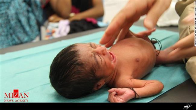 نوزاد پناهجویی که در قایق‌نجات به دنیا آمد+تصاویر