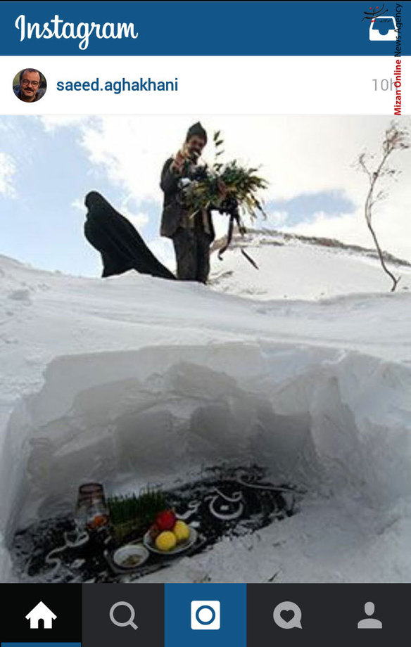 عکس سعید آقاخانی از برپایی سفره هفت سین بر روی سنگ قبر، نیم متر زیر برف