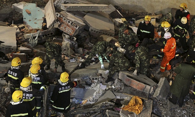یک ساختمان مسکونی در چین فروریخت/40 تن کشته و زخمی شدند+عکس