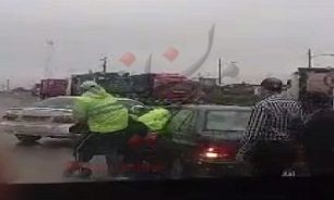 ماجرای کتک زدن یک راننده توسط مامور پلیس راهور+عکس