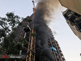 آتش سوزی در برج در حال ساخت در نیاوران تهران
