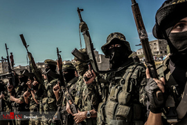 اعضای مسلح جنبش جهاد اسلامی در مراسم تشییع قربانیان حمله اخیر اسرائیل به نوار غزه