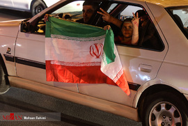 شادی مردم  بعد از بازی ایران و پرتغال در مشهد