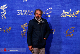 سیامک صفری ، بازیگر ، در فرش قرمز فیلم سینمایی زهرمار