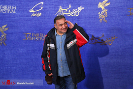 خسرو احمدی، بازیگر، در فرش قرمز فیلم سینمایی خون خدا
