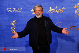 حسن پورشیرازی، بازیگر، در فرش قرمز فیلم سینمایی قسم