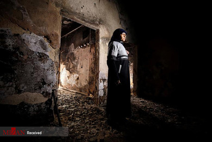 زن فلسطینی در خرابه خانه اش بعد از حملات رژیم صهیونستی.