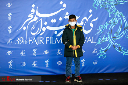 محمد آلبو علی بازیگر خردسال ، در هشتمین روز از سی و نهمین جشنواره فیلم فجر
