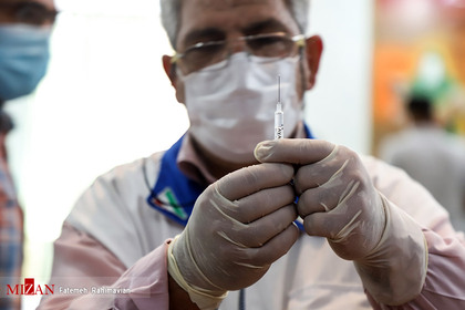 واکسیناسیون پاکبانان و کارکنان آرامستان‌های اهواز
